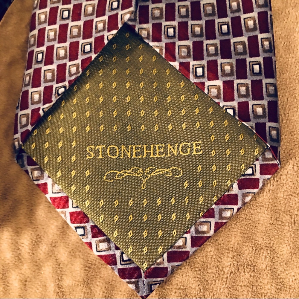 Stonehenge Tie Color: Golden and burgundy's